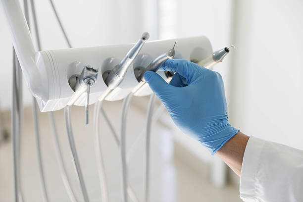 Professional Tooth Extraction technician working in Stafford, TX